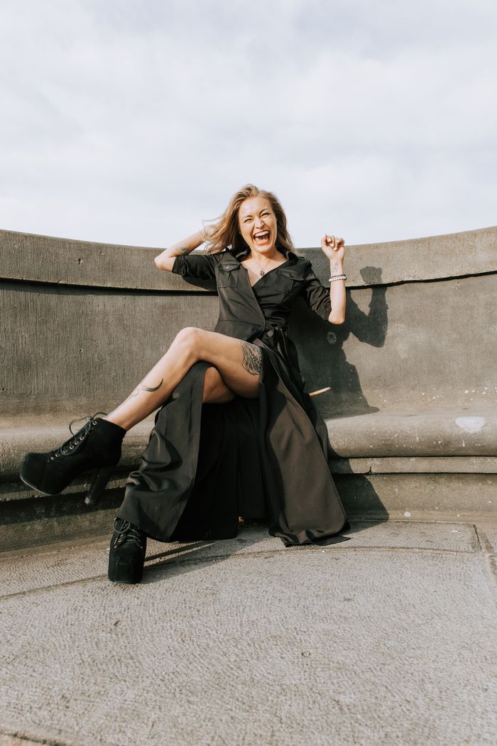 Arnika Aluri laughing, black dress