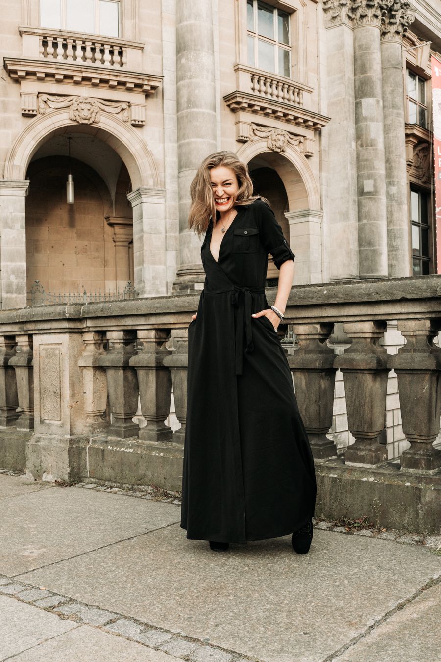 Arnika Aluri standing in front of a historic Berlin building